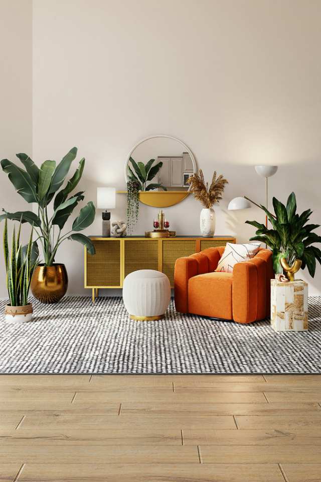 80s style living room with bold orange armchair and patterned area rug